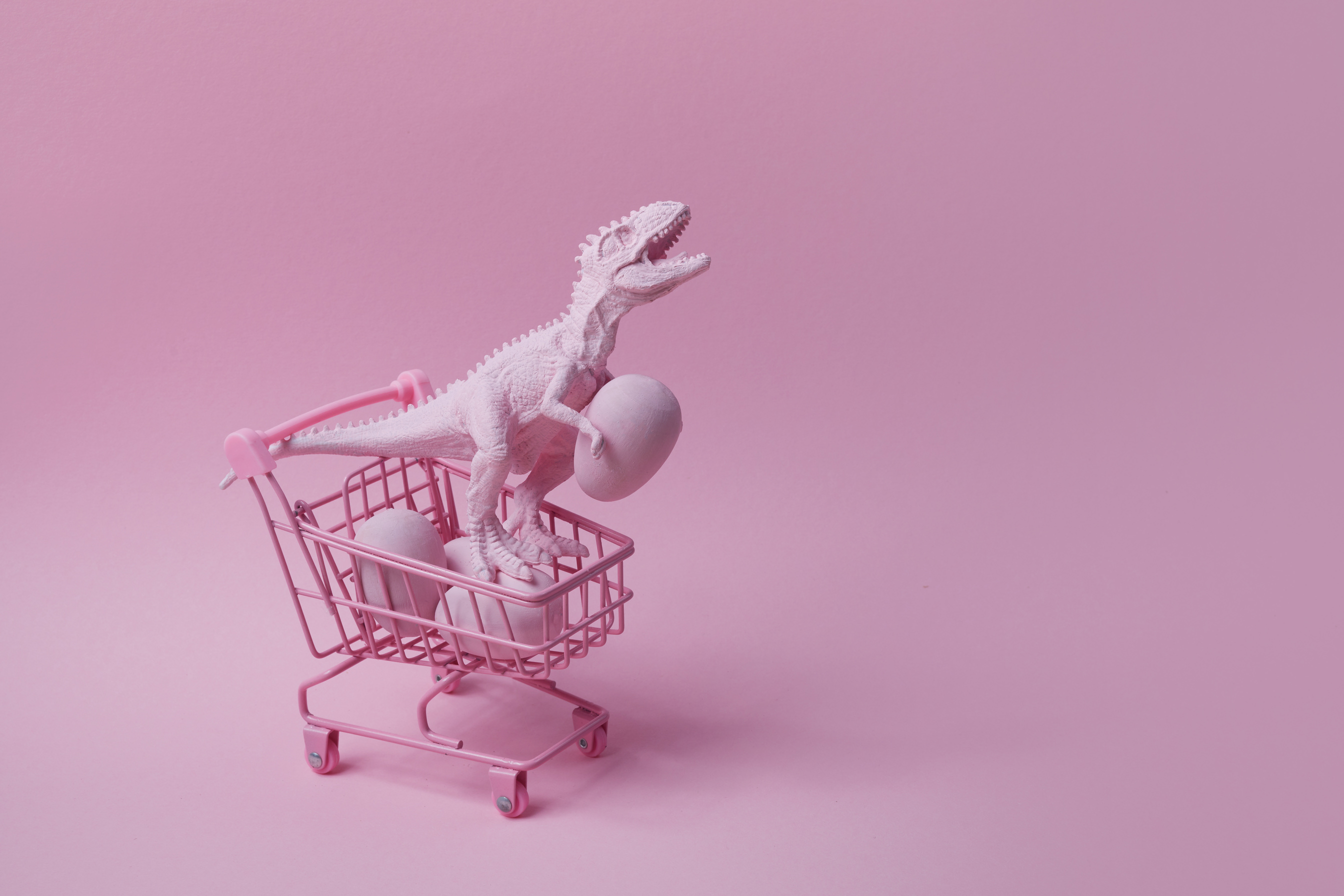 Pink T Rex Dinosaur with Eggs in a Shopping Cart